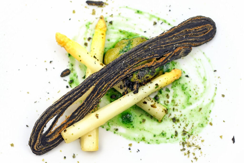 A spring plant-based asparagus dish served by vegan chef Alexis Gauthier
